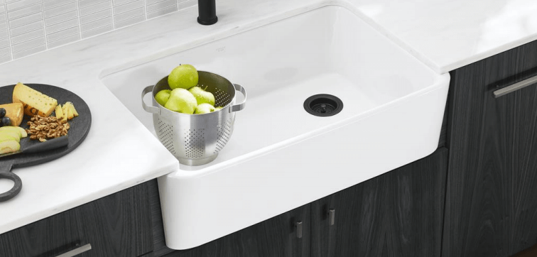 Kohler Ironridge farmhouse sink in kitchen with bowl of fruit | Farmhouse Kitchen Sink | Weinstein Collegeville