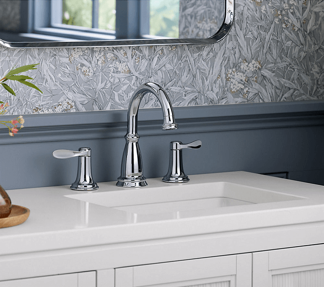 Up close photograph of a Kohler Bellera bathroom faucet and handles in bathroom | Kohler Bellera Bathroom Faucet Collection | Weinstein Collegeville